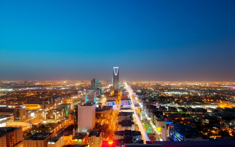 Night view of Riyadh city with illuminated Kingdom Centre Tower